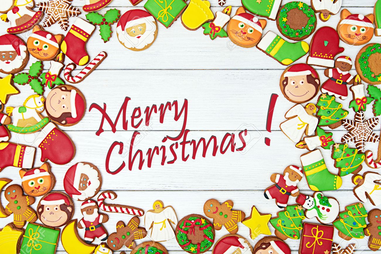 merry christmas card with variety of gingerbread cookies with