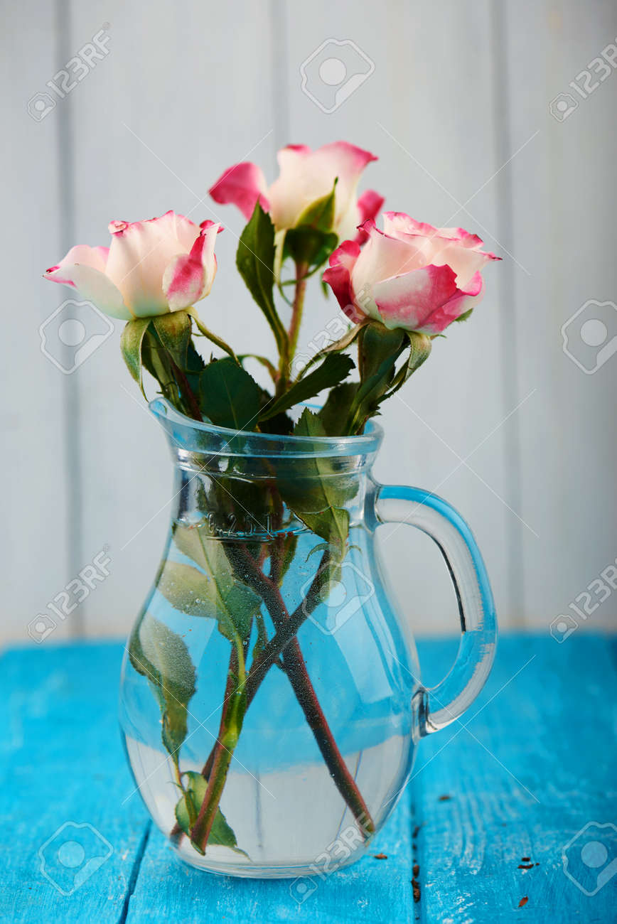Three Pink Roses Floral Arrangement With Stems And Leaves In Stock Photo Picture And Royalty Free Image Image 53786780