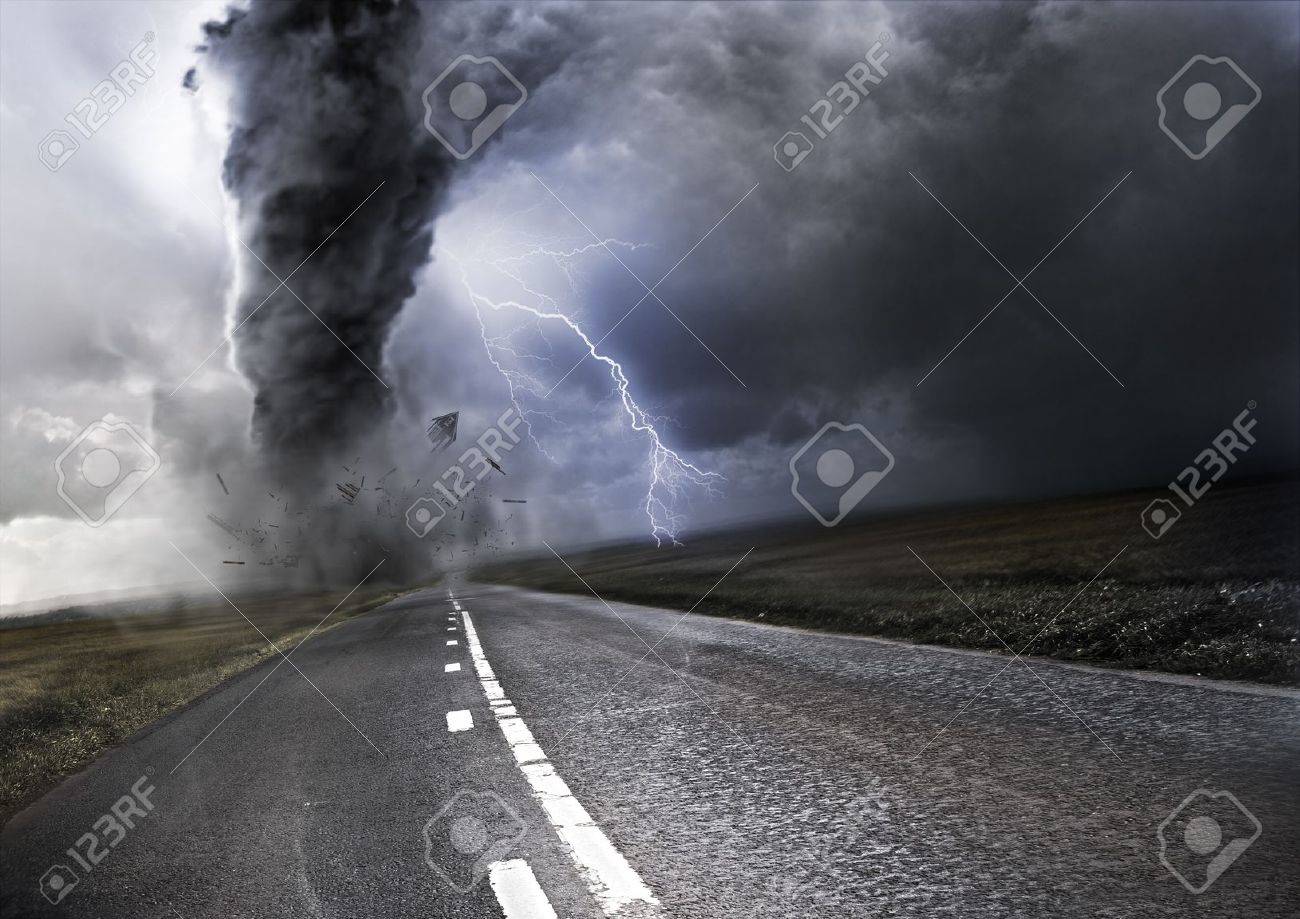 powerful tornado destroying property with lightning in the stock