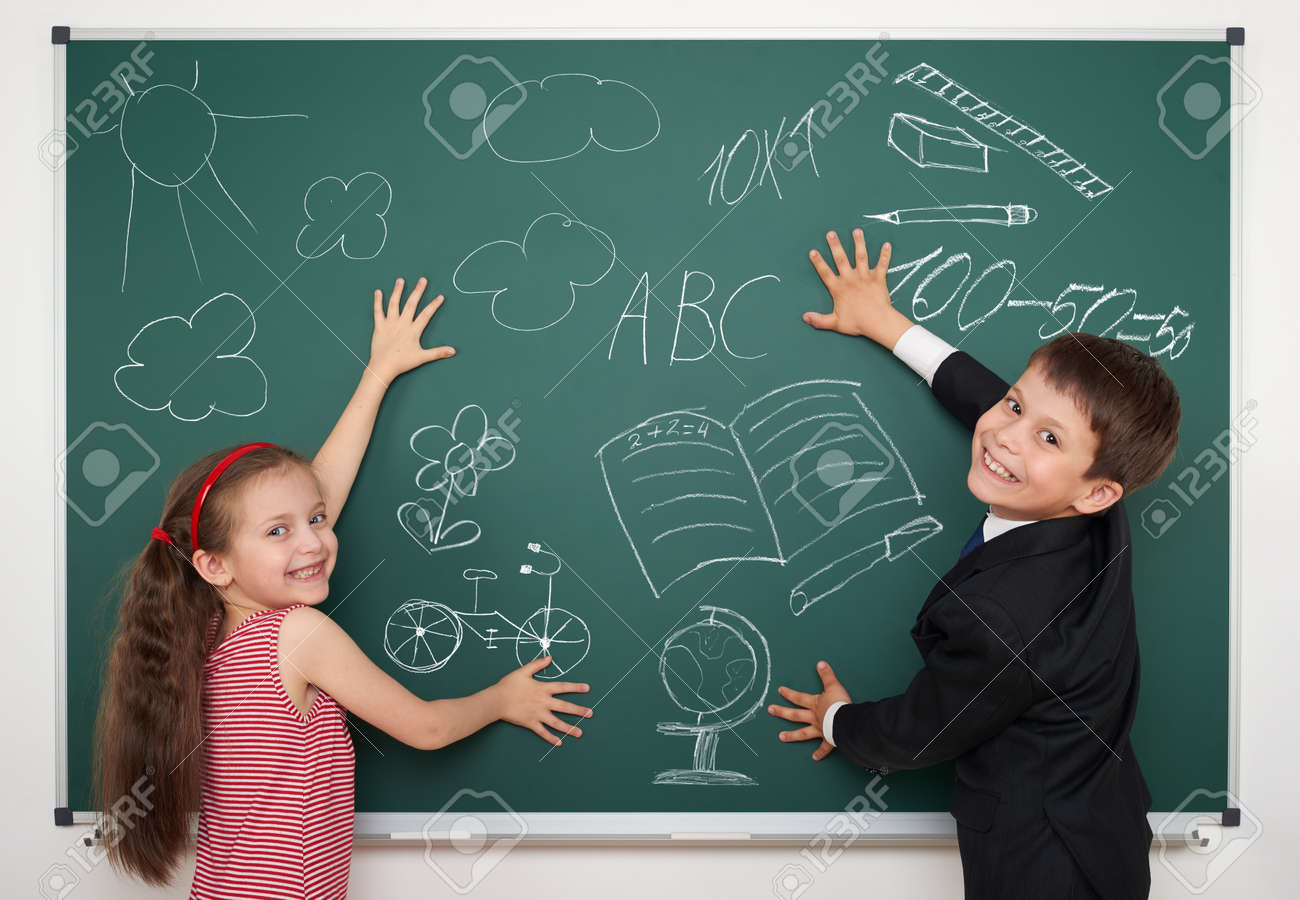 School Boy And Girl Drawing On Board Stock Photo Picture And Royalty Free Image Image