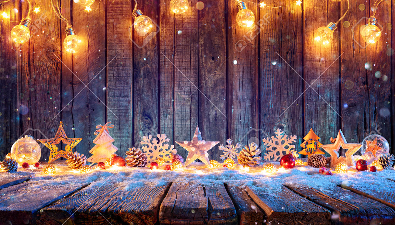 Christmas Ornament With String Lights On Rustic Wooden Table - 157152233 Christmas Ornament With String Lights On Rustic Wooden Table - 157152233