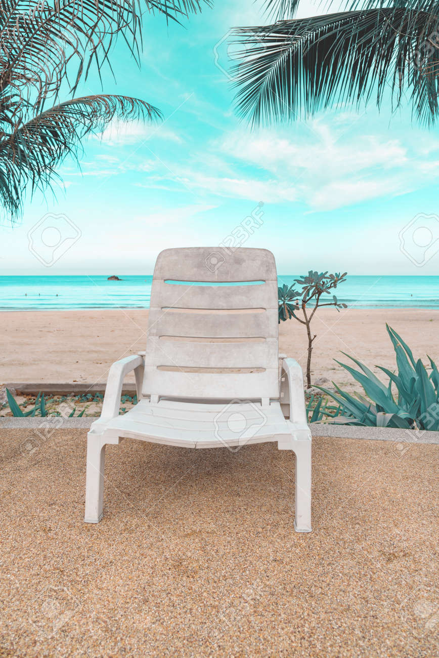 Tropical Swimming Pool Lounge Chairs On The Beach Beautiful