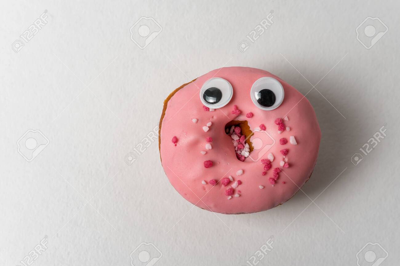 142203751-pink-donut-funny-face-with-googly-eyes-on-white-background-food-with-funny-faces.jpg