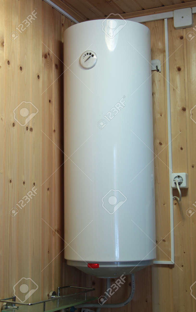 Calentador De Agua Electrico Colgado En La Pared De Madera Fotos