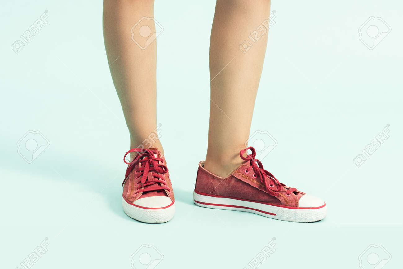 Women shoes. sports shoes ,sneakers. Closeup of woman legs and.. Women shoes. sports shoes ,sneakers. Closeup of woman legs and..