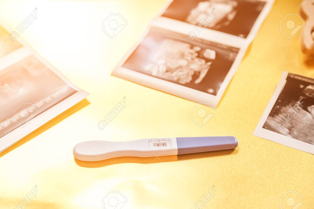 Gender Neutral Names Unisex Nursery Gender Neutral Calm Nursery Color Palette Games Flat Lay A Snapshot Of An Ultrasound Scan Strollers A Pregnancy Test On A Gold And Silver Metallic Backgroun Stock Photo