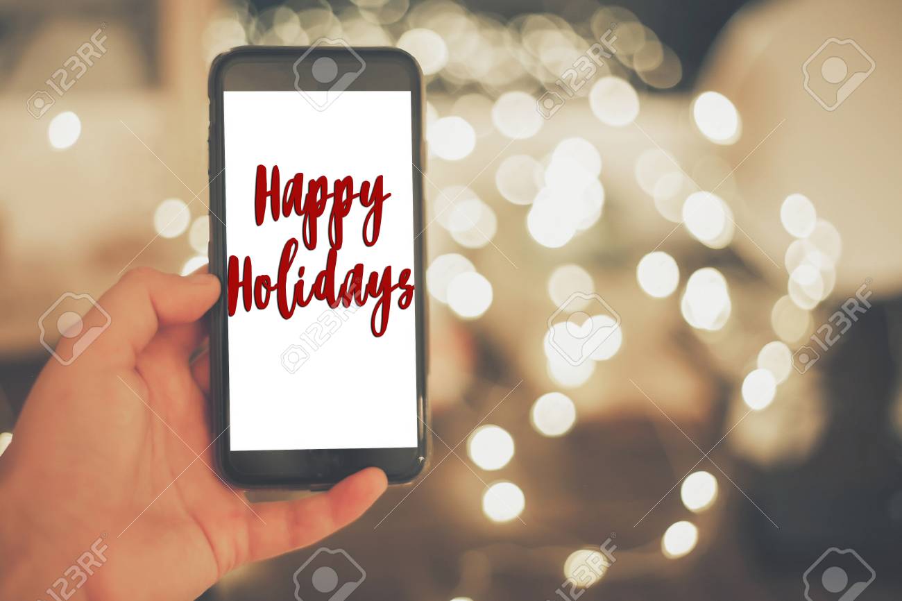 Signe De Texte Joyeuses Fetes Main Tenant Un Telephone Intelligent