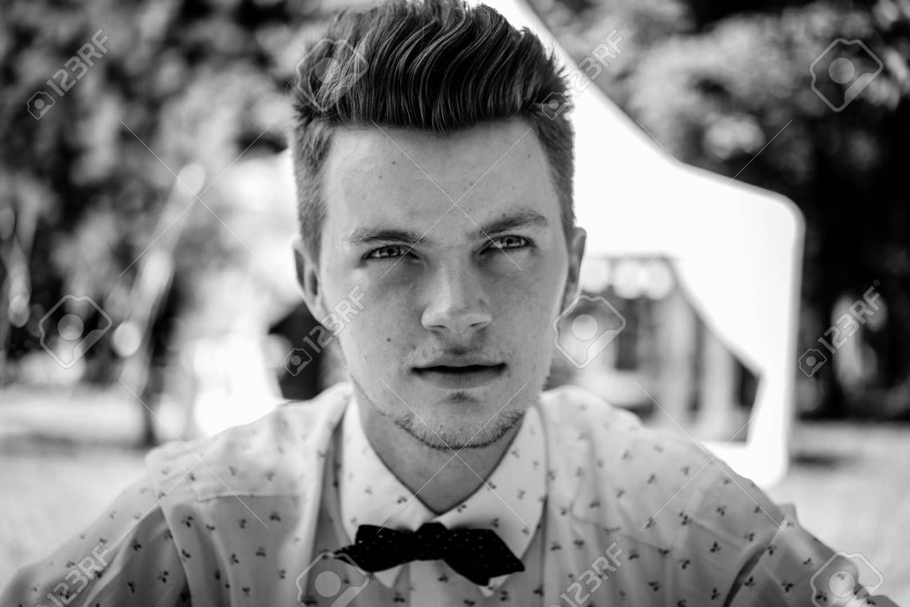 Stylish Handsome Bearded Blonde Man At Wedding Reception Outdoors