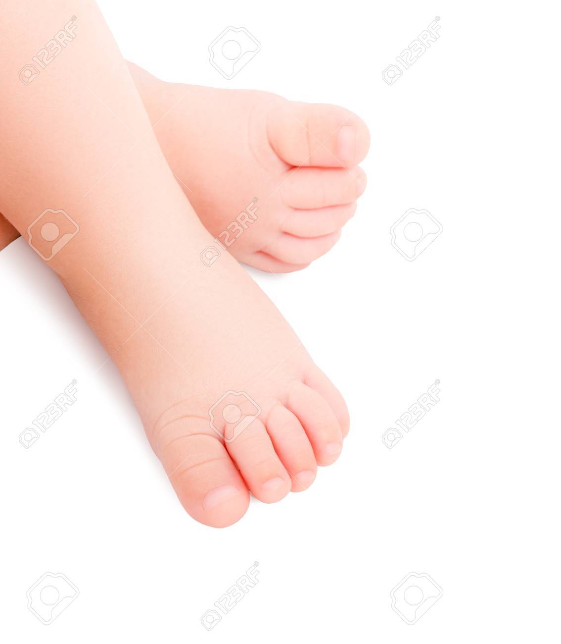 Beautiful legs of a newborn baby isolated on white background stock photo 83280008