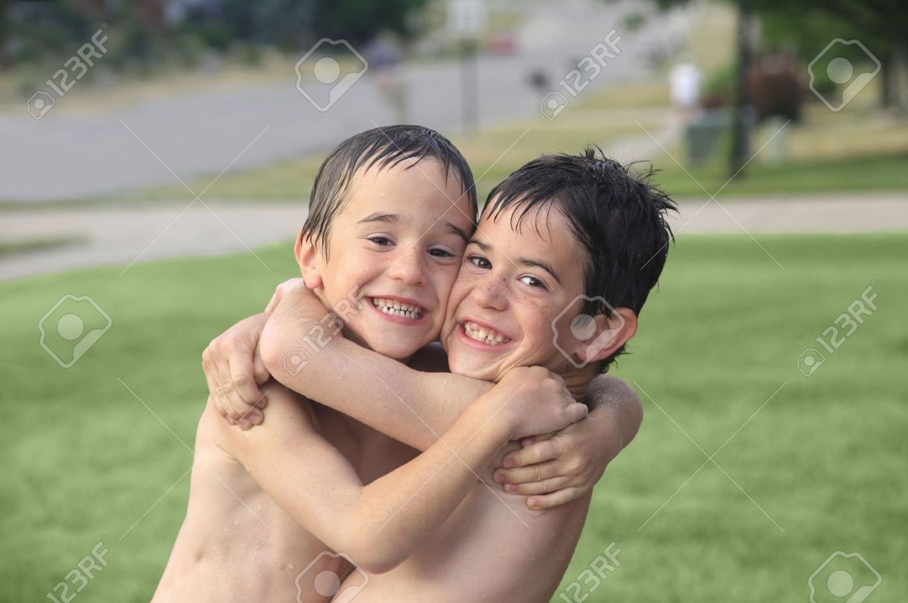 Naked boys on the grass