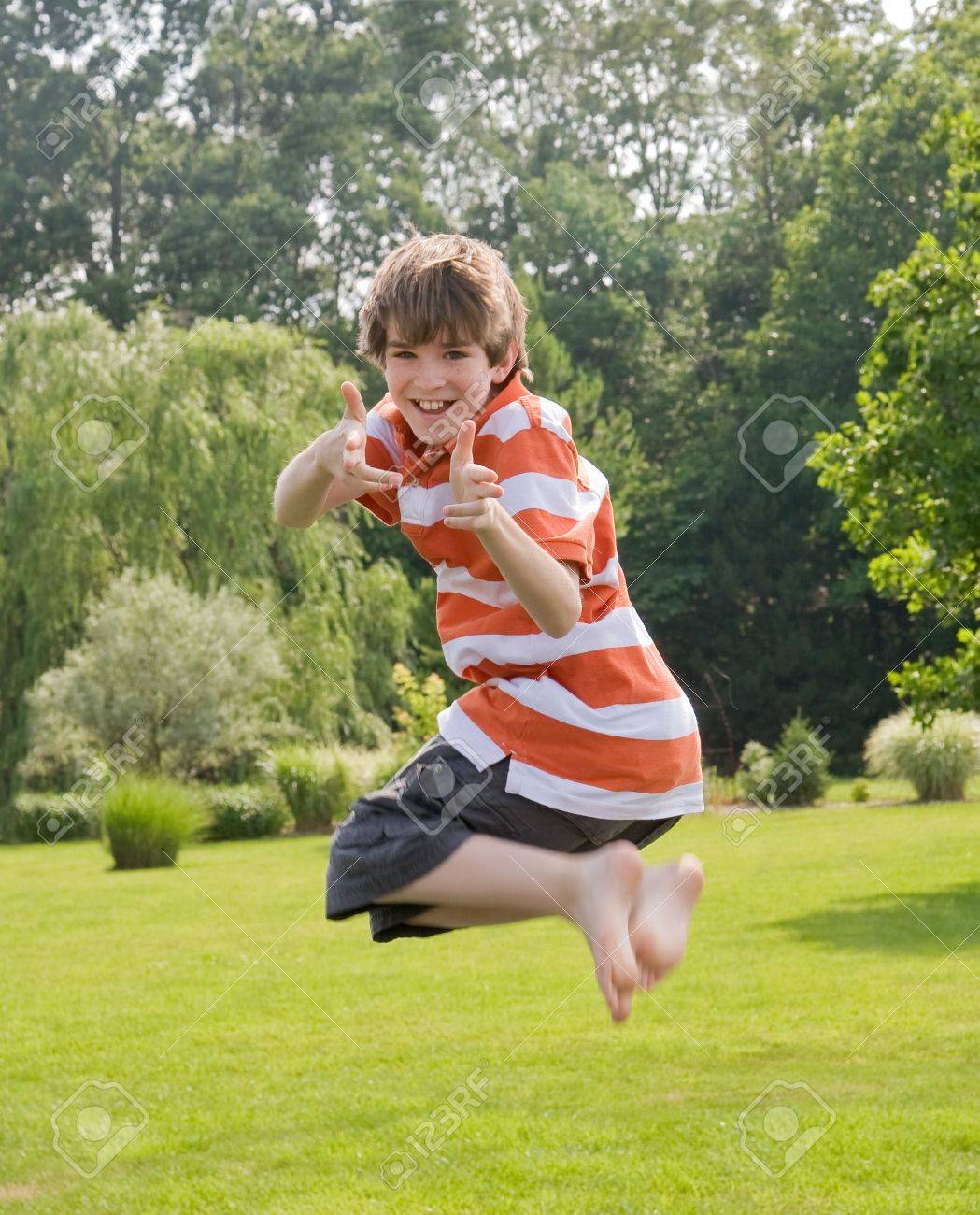 Boy Jumping in the Air - 3239590 Boy Jumping in the Air - 3239590