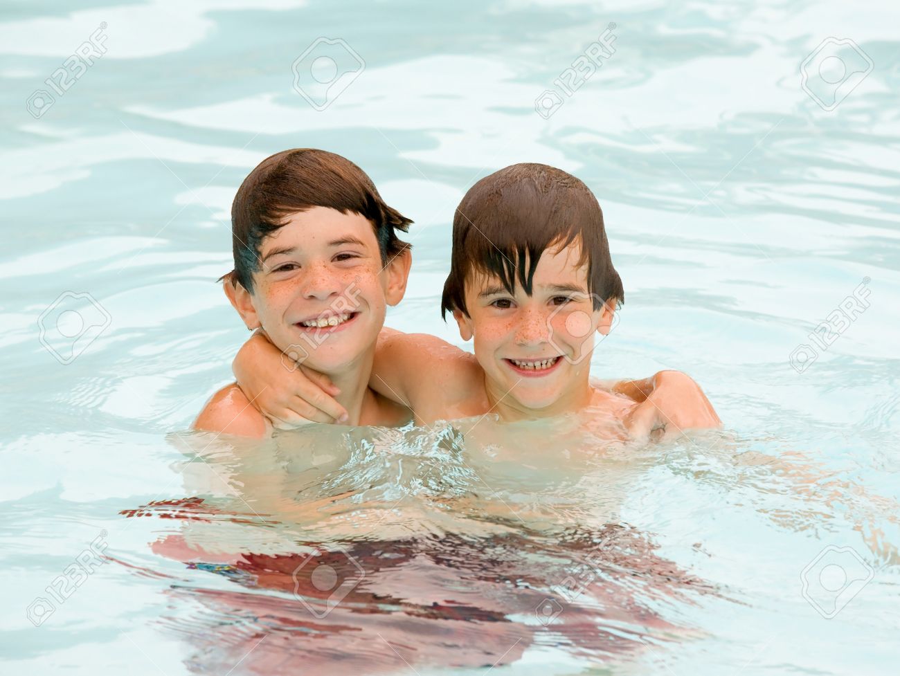 Boys Having a Fun Time at the Pool - 4568805 Boys Having a Fun Time at the Pool - 4568805