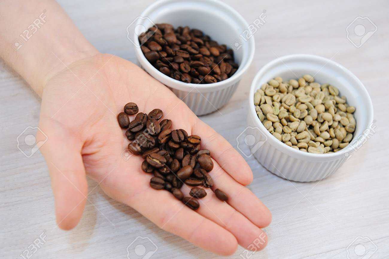 Unroasted Coffee Beans >> Roasted And Green Unroasted Coffee In Bowls Freshly Roasted Unroasted Coffee Beans >> Roasted And Green Unroasted Coffee In Bowls Freshly Roasted