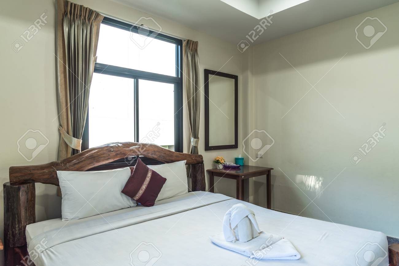 Tropical Bedroom Interior With Double Bed And Seascape View