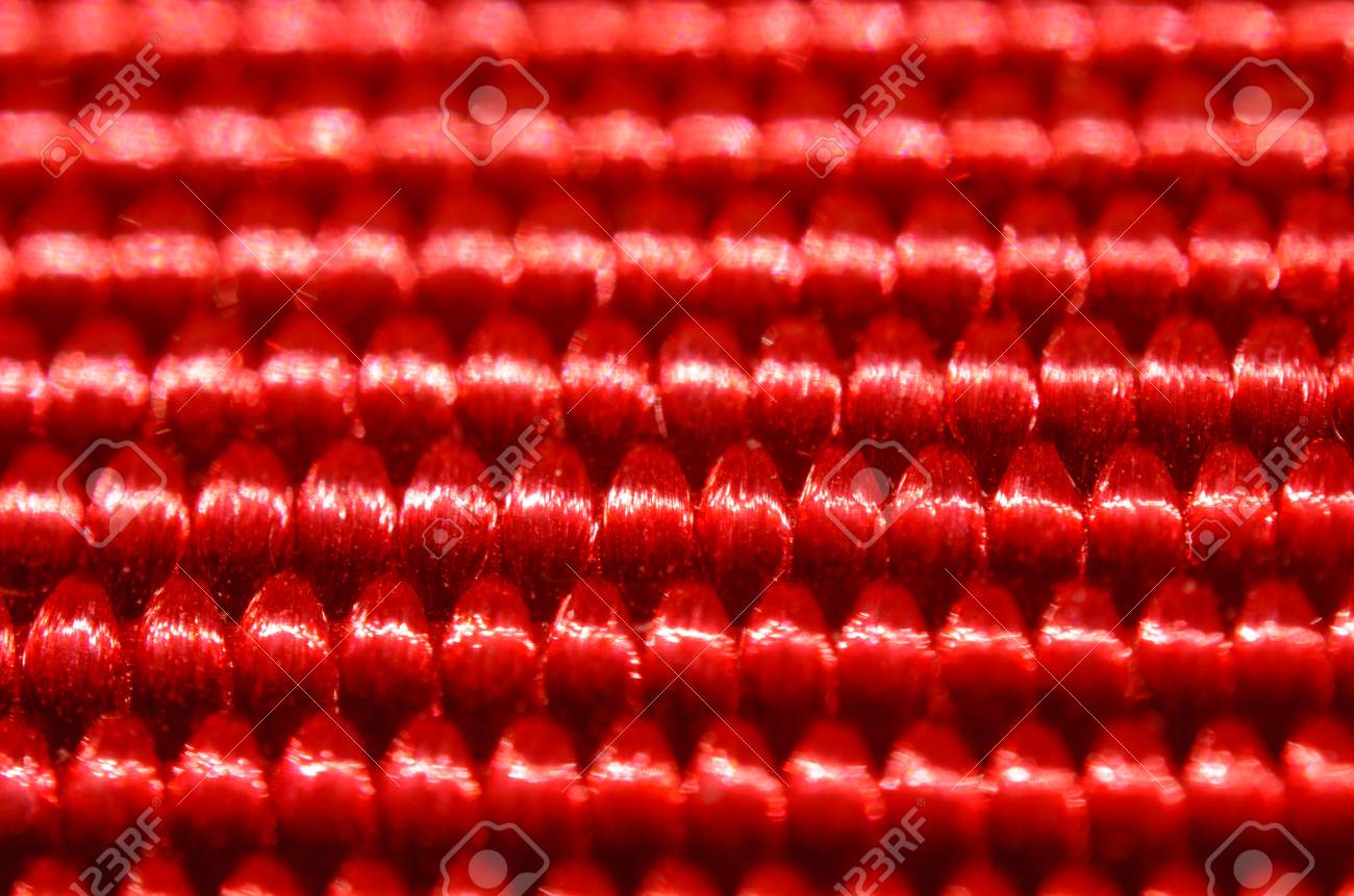 Red Nylon Belt Close-up. Shallow Depth Of Field. The Interweaving Of The  Fibers In The Belt Texture As Abstract Background Stock Photo, Picture and  Royalty Free Image. Image 80679231.