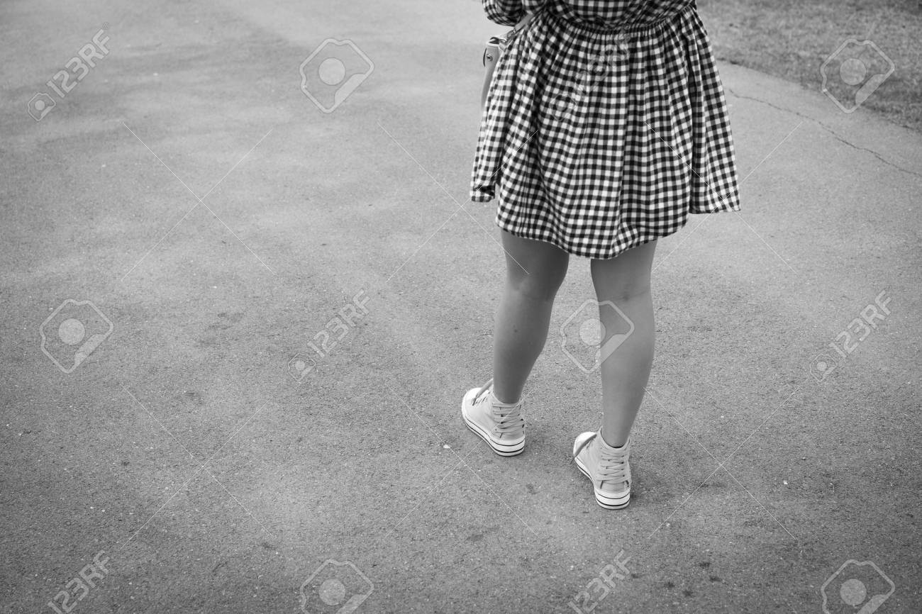 woman walking cross road