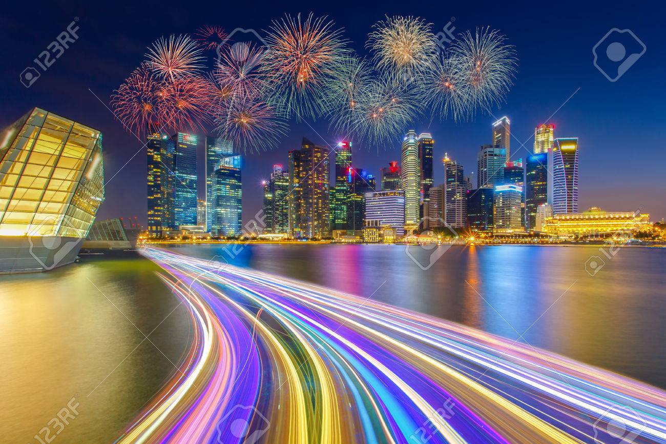 Landscape of the Singapore financial district and business building with speed light on the river in Singapore national day fireworks celebration. - 58068322 Landscape of the Singapore financial district and business building with speed light on the river in Singapore national day fireworks celebration. - 58068322