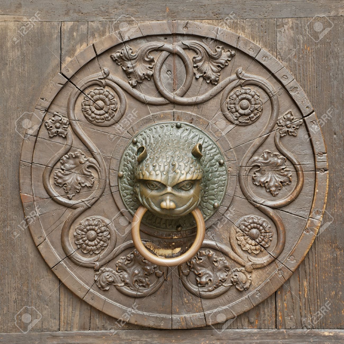 Grunge Medieval Background - Rusty Antique Door Knocker Stock Photo Grunge medieval background - rusty antique door knocker Stock Photo - 12412005 - Grunge Medieval Background - Rusty Antique Door Knocker Stock Photo