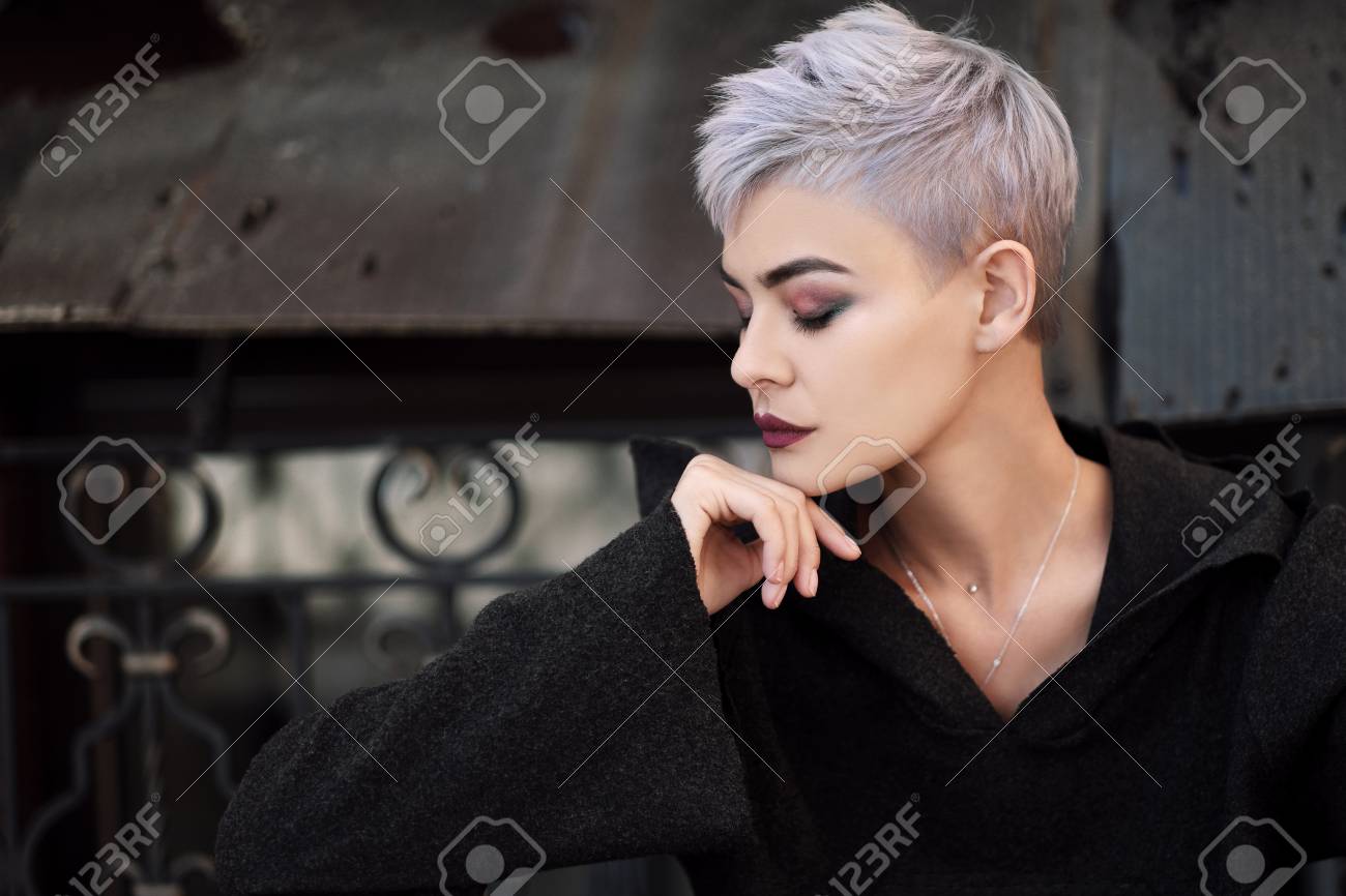 Young Beautiful Girl With Short Gray Hair In A Black Jacket And