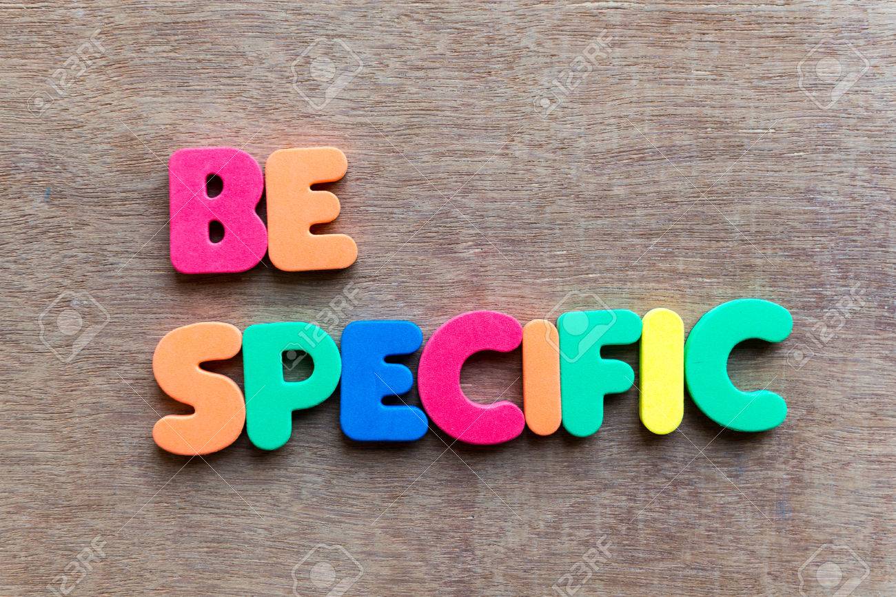 Be Specific Colorful Word In The Wooden Background Stock Photo, Picture and  Royalty Free Image. Image 35790796.