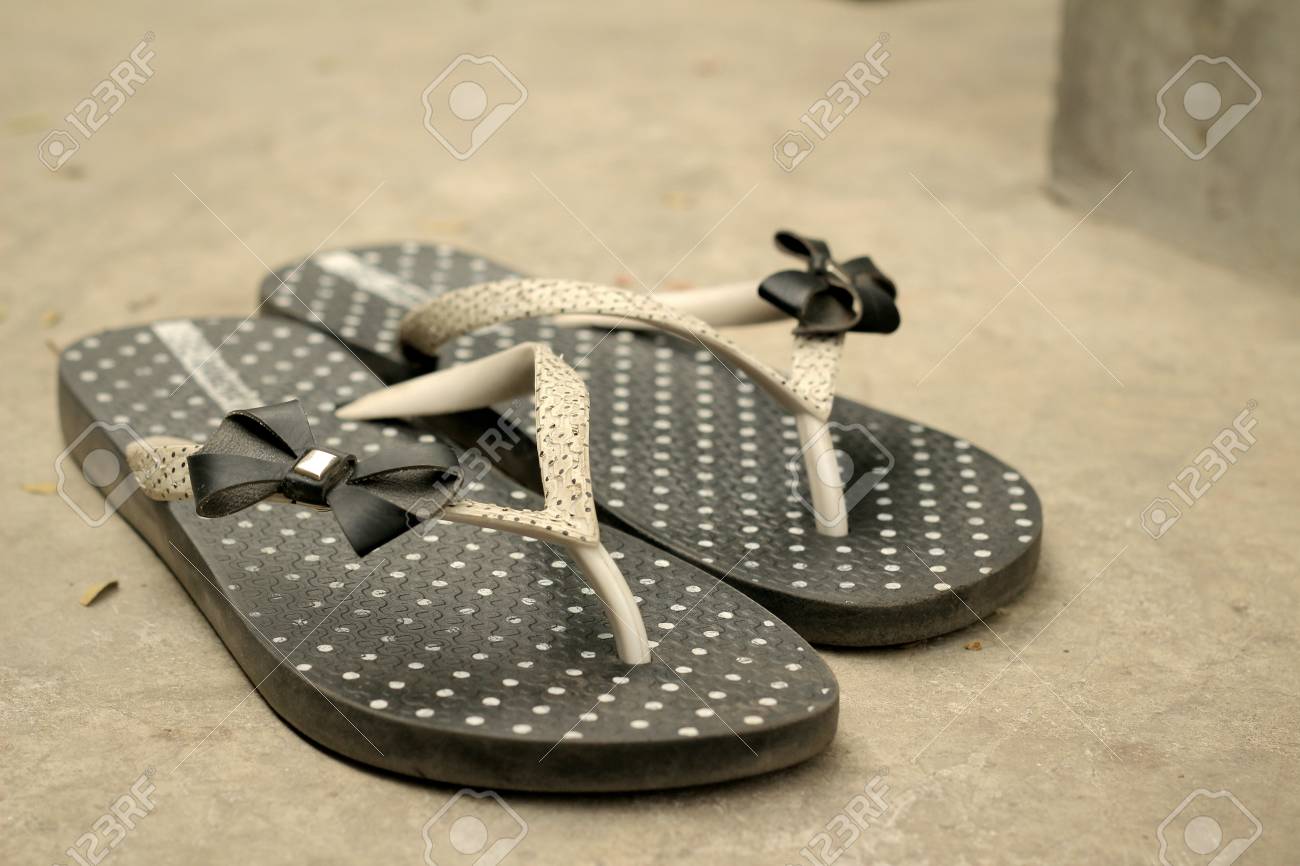 black and white polka dot flip flops