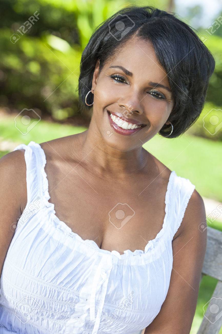 A Beautiful Happy Middle Aged African American Woman Relaxing.. Stock  Photo, Picture And Royalty Free Image. Image 33150322.