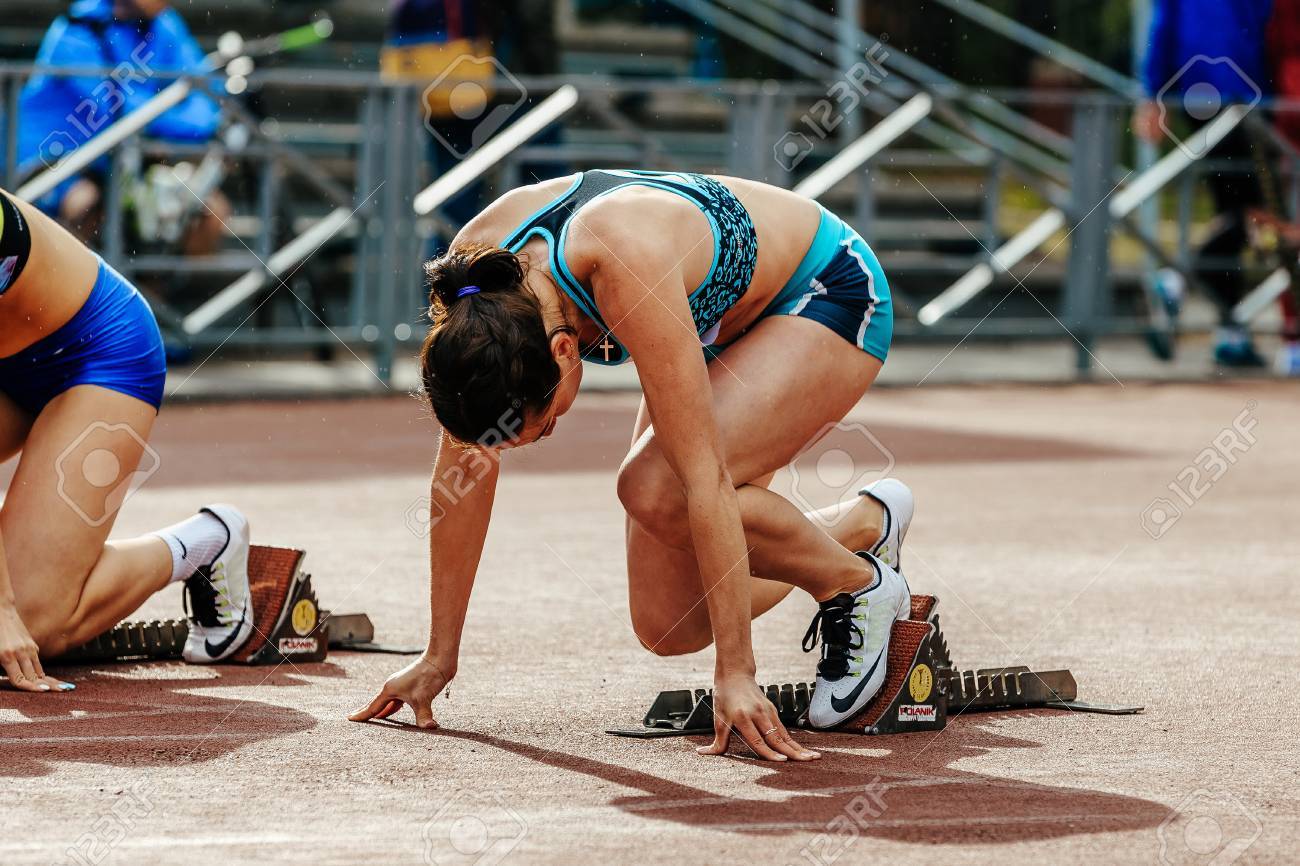 Chelyabinsk, Russia - June 4, 2017: ready start female athlete sprinter run 100 meters during UrFO Championship in athletics - 81750318 Chelyabinsk, Russia - June 4, 2017: ready start female athlete sprinter run 100 meters during UrFO Championship in athletics - 81750318