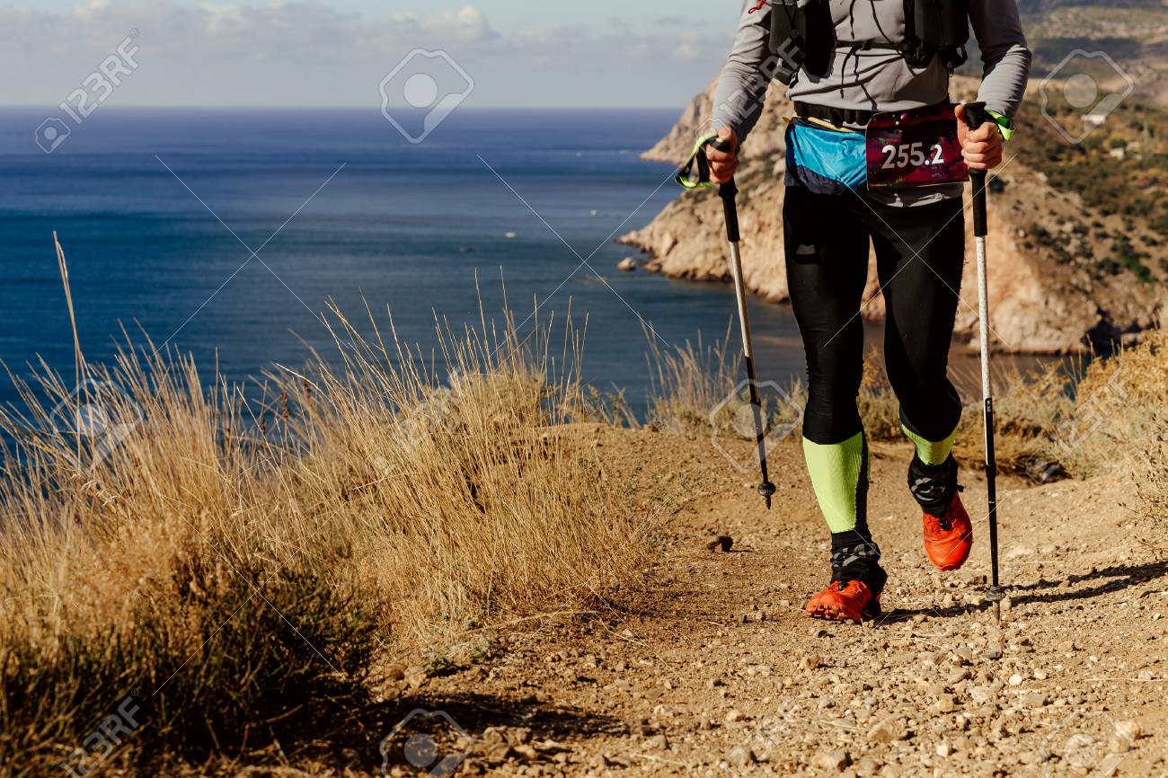 running with trekking pole