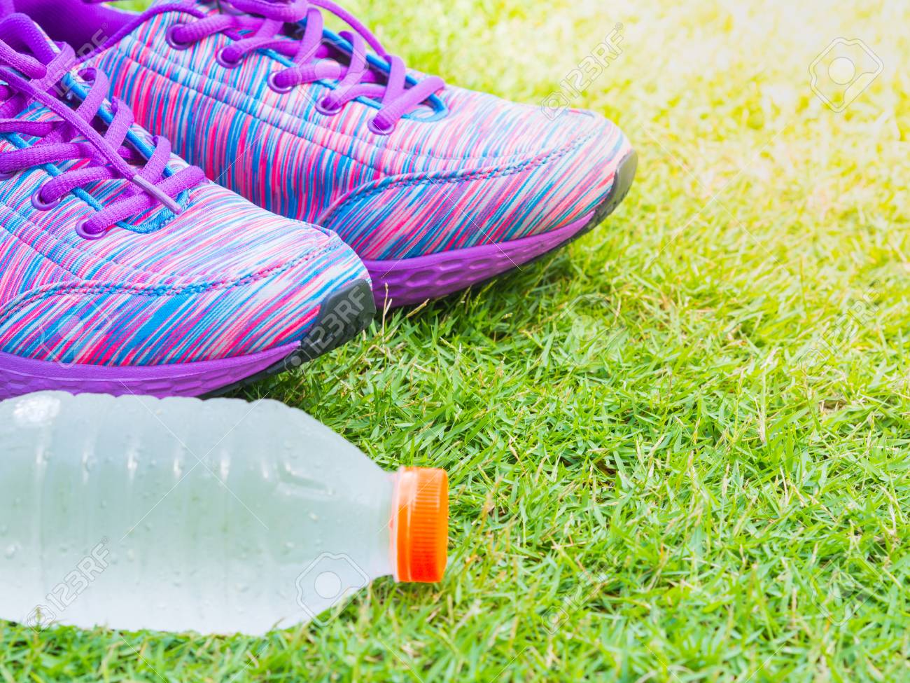 running shoes on grass