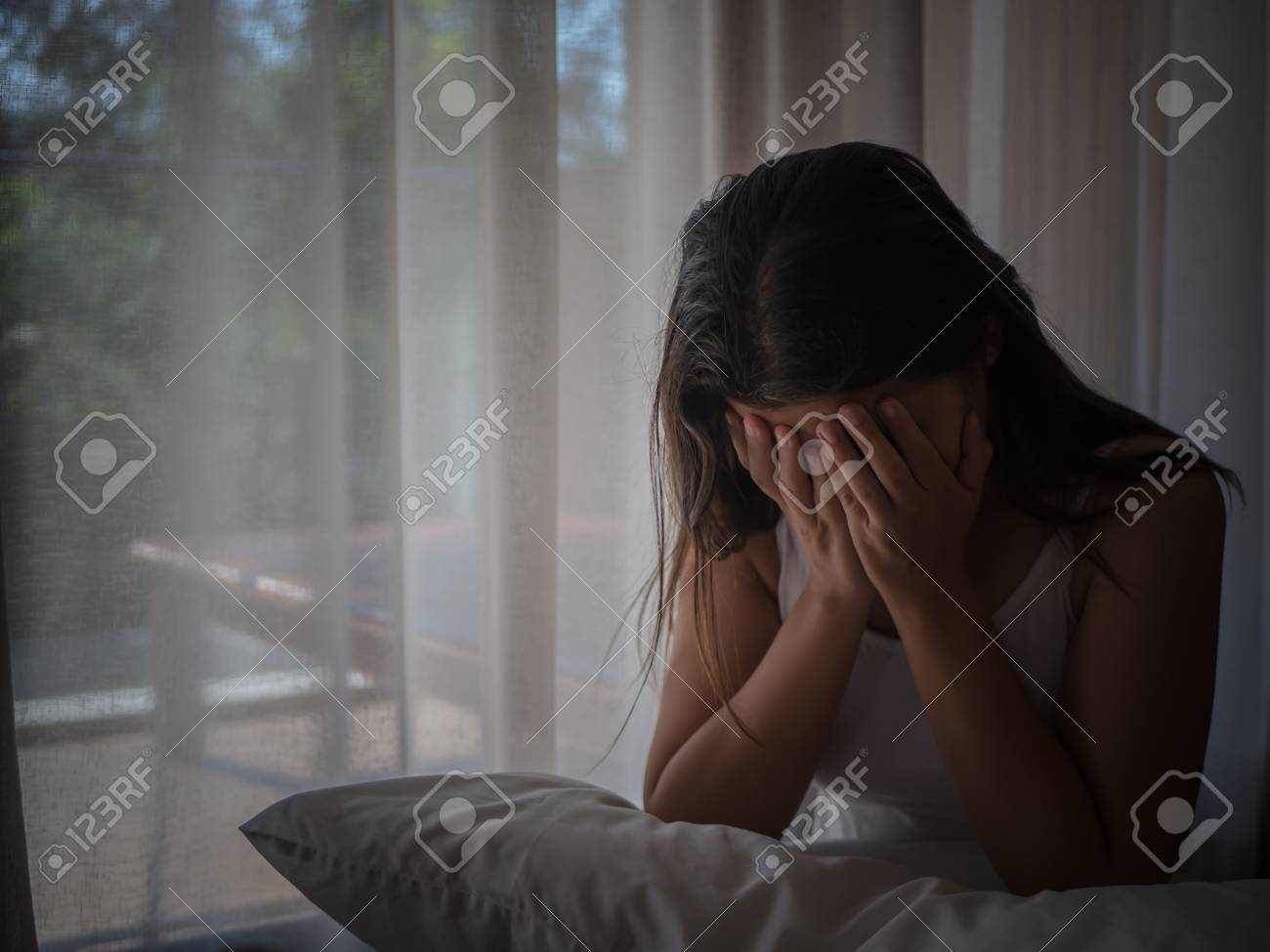 Closeup Depressed Woman Crying While Sitting Alone On The Wooden ...