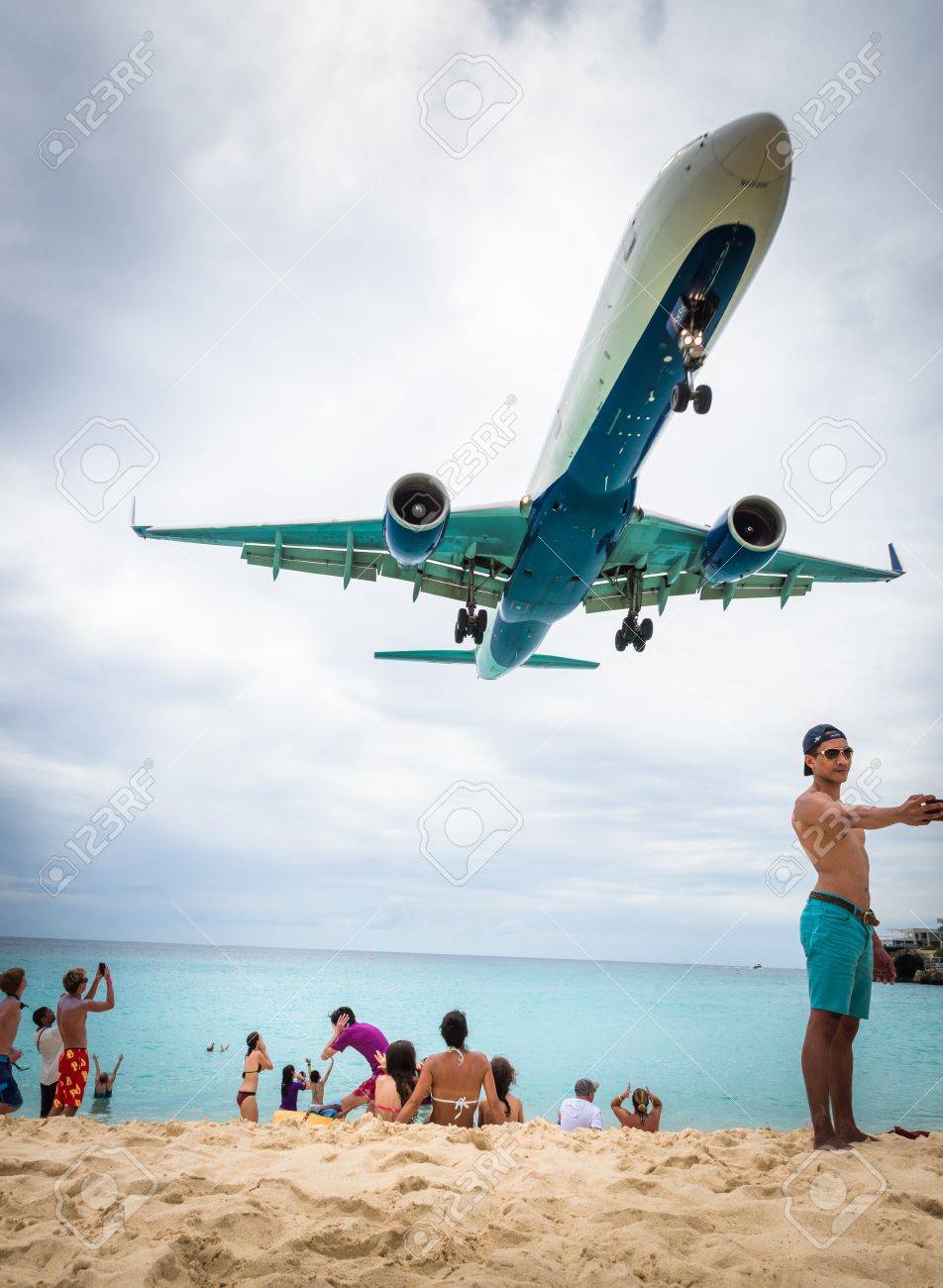 Plane Landing Flying Over Famous Maho Beach