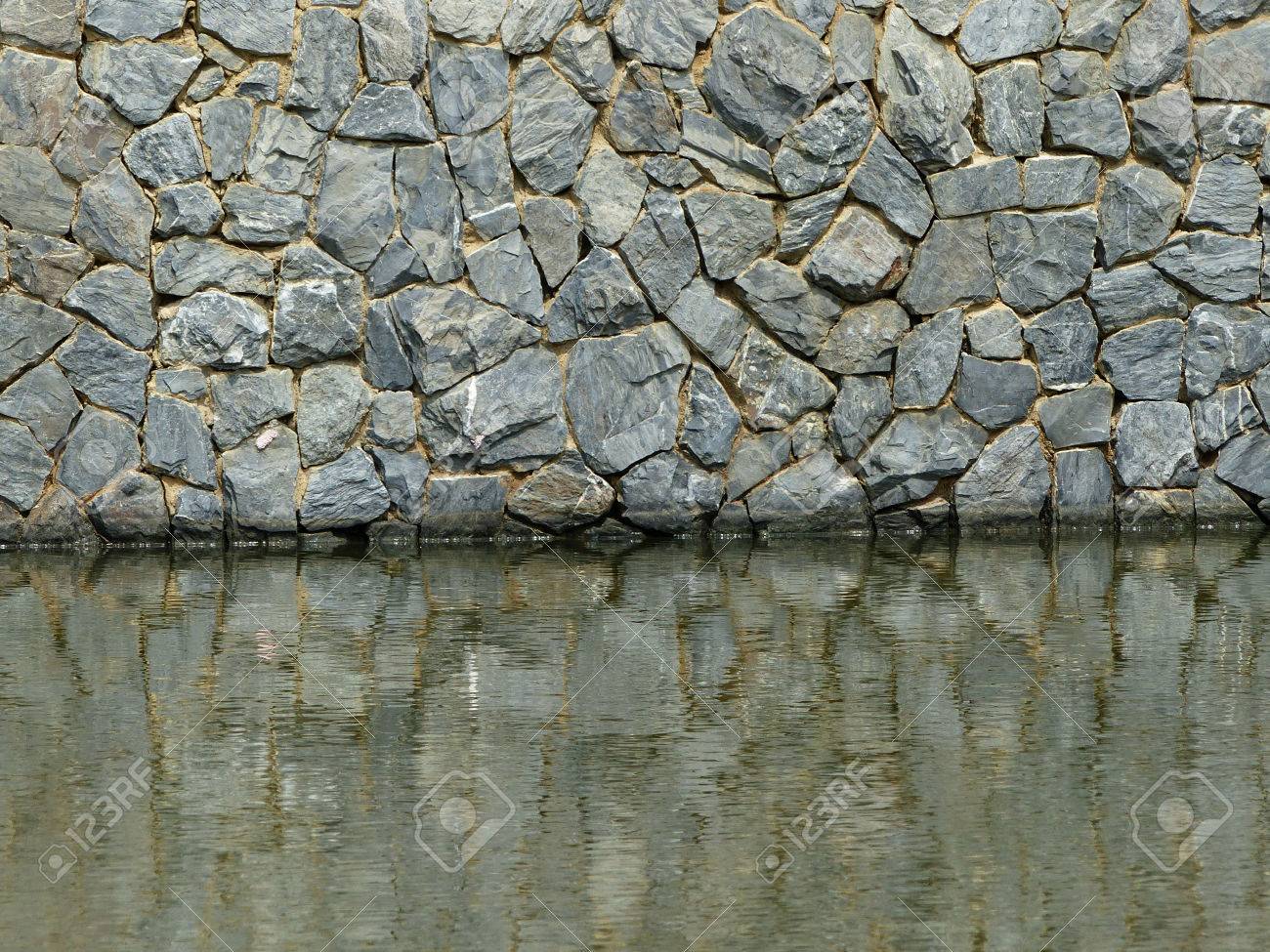 Stone Wall And Water Reflection Stock Photo Picture And Royalty Free Image Image