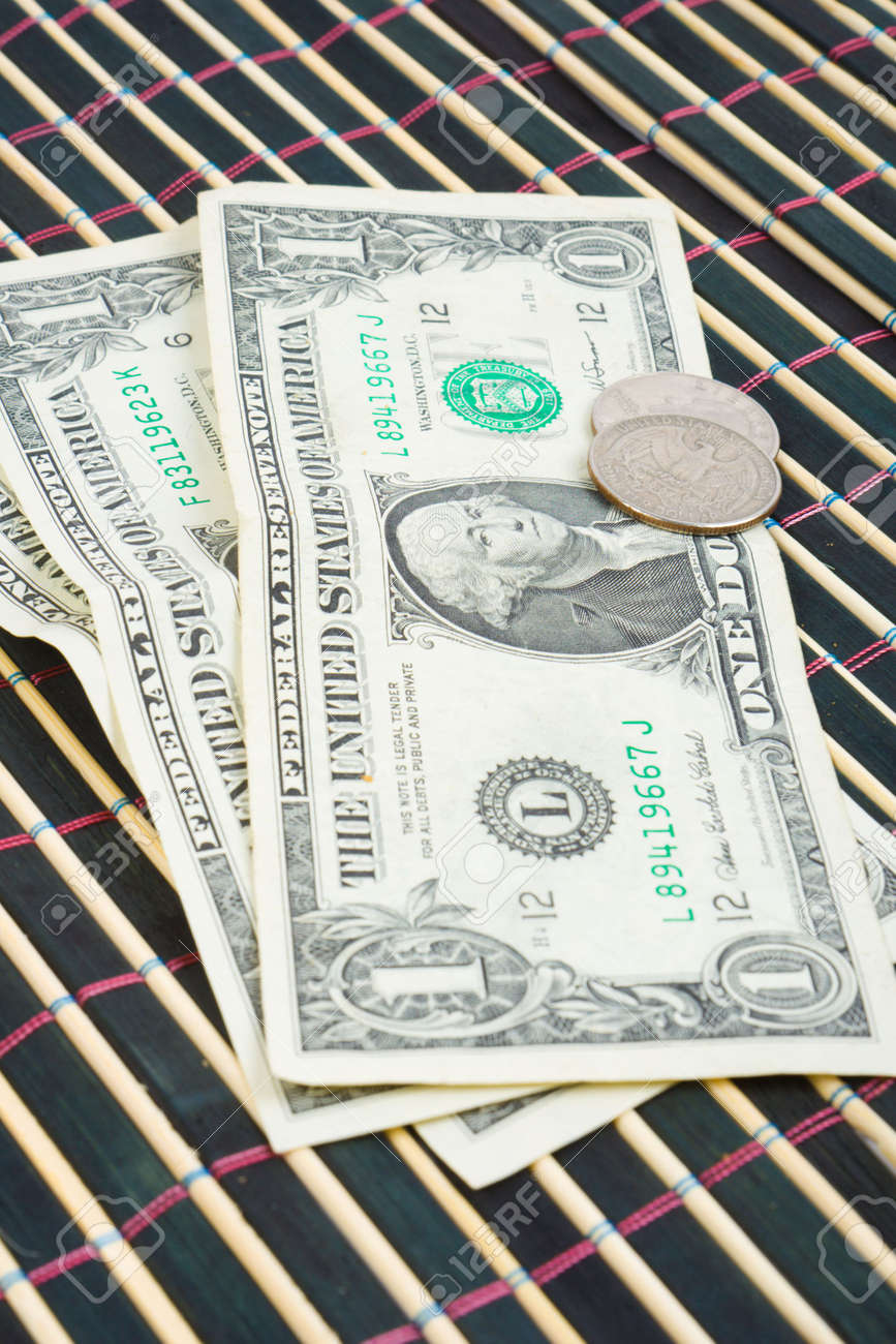 three dollars and 50 cent on bamboo table cloth stock photo picture