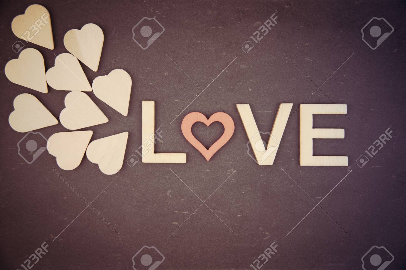 Stock Photo Word Love Created Of Wood Letters Over Vintage Chalkboard Retro Filter Applied Wood Letters Originated Of Wooden Hearts Letter O Replaced Stock Photo Word Love Created Of Wood Letters Over Vintage Chalkboard Retro Filter Applied Wood Letters Originated Of Wooden Hearts Letter O Replaced