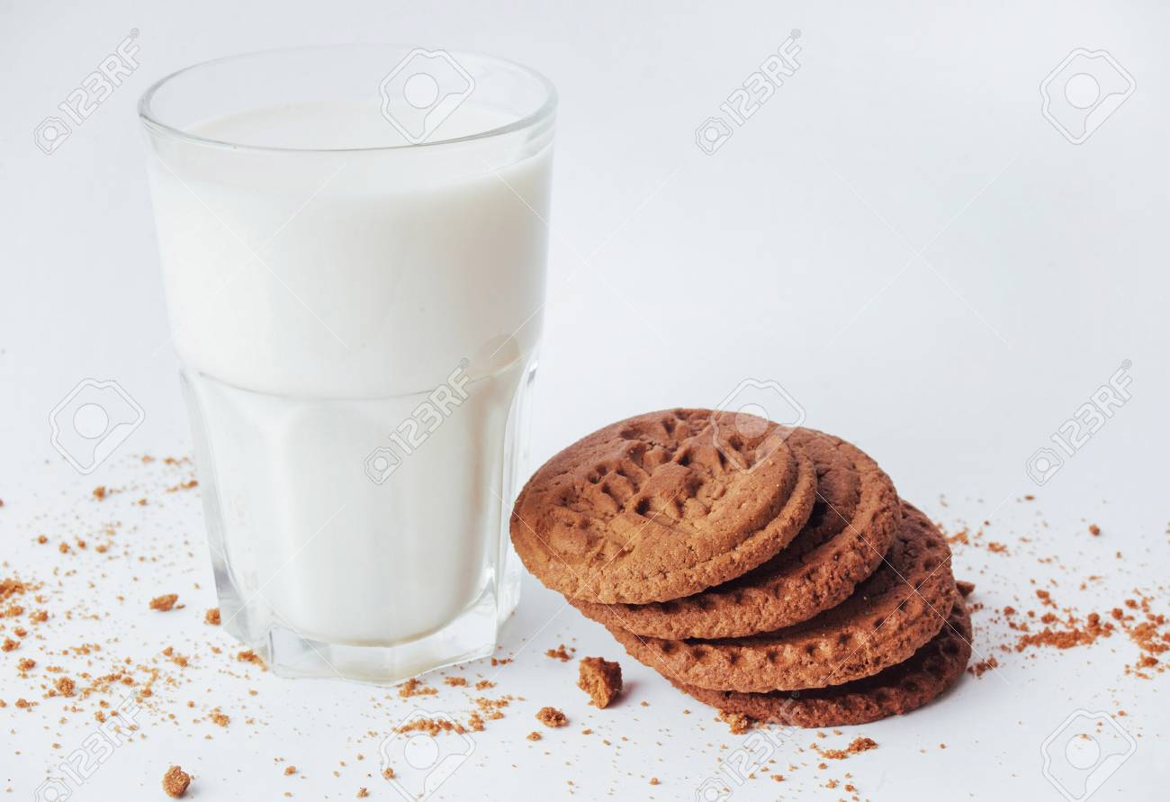 Transparent Glass Of Milk And Cookies On A White Background Stock Photo Picture And Royalty Free Image Image 72115877