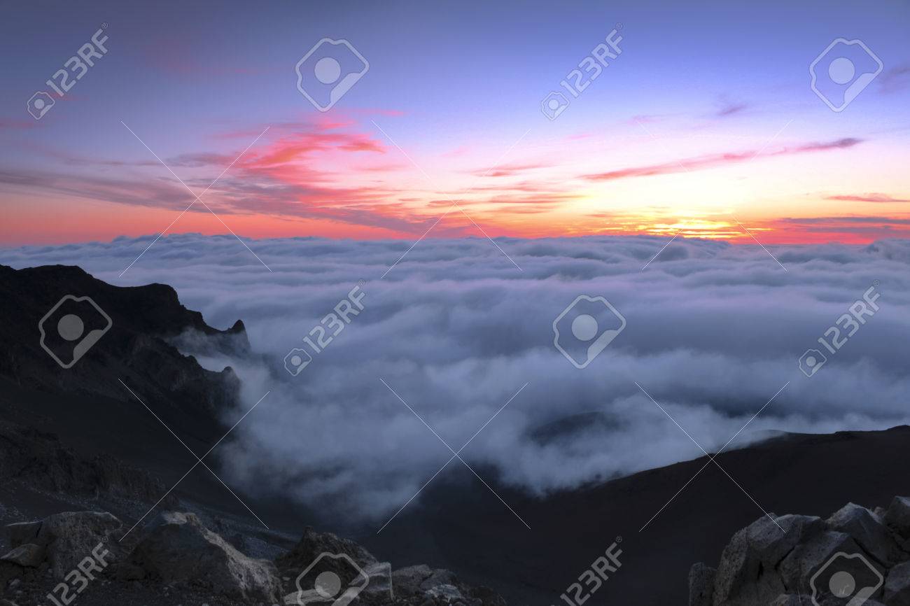 Sunrise Above The Clouds At The Summit Of The Dormant Volcano 