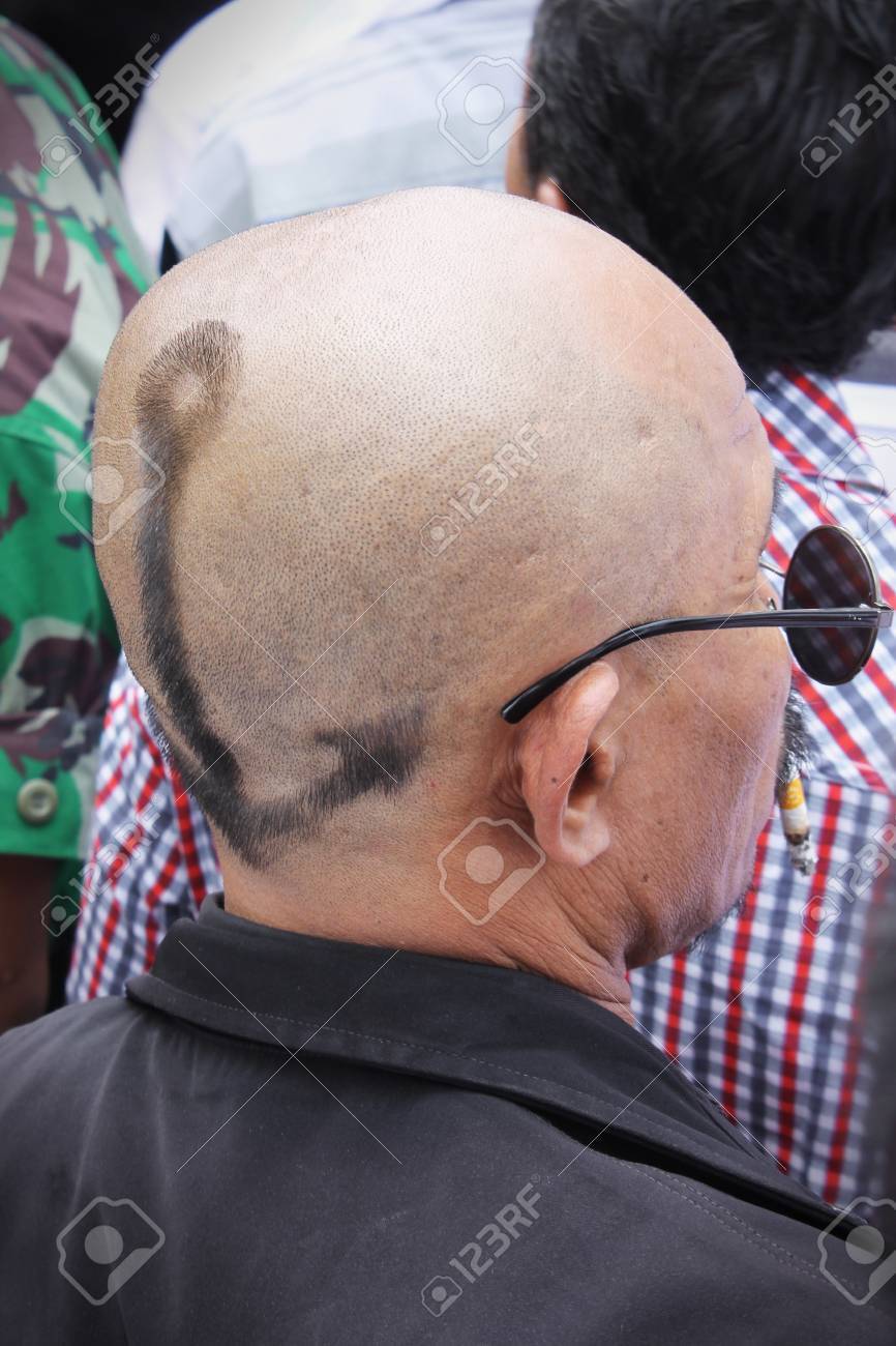 jakarta indonesia october 20 2014 baldy man with sun glasses