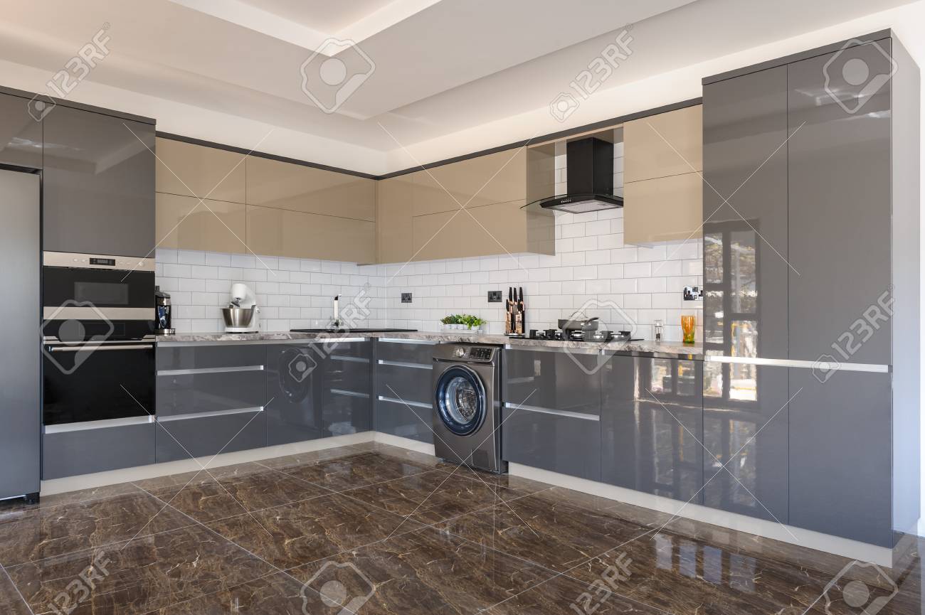Luxury Modern White Beige And Grey Kitchen Interior Stock Photo Picture And Royalty Free Image Image 125236645
