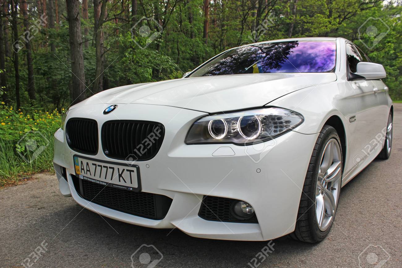 White Bmw 520 Tdi F10 M Sport In The Forest Road Kiev Ukraine Stock Photo Picture And Royalty Free Image Image 97175412
