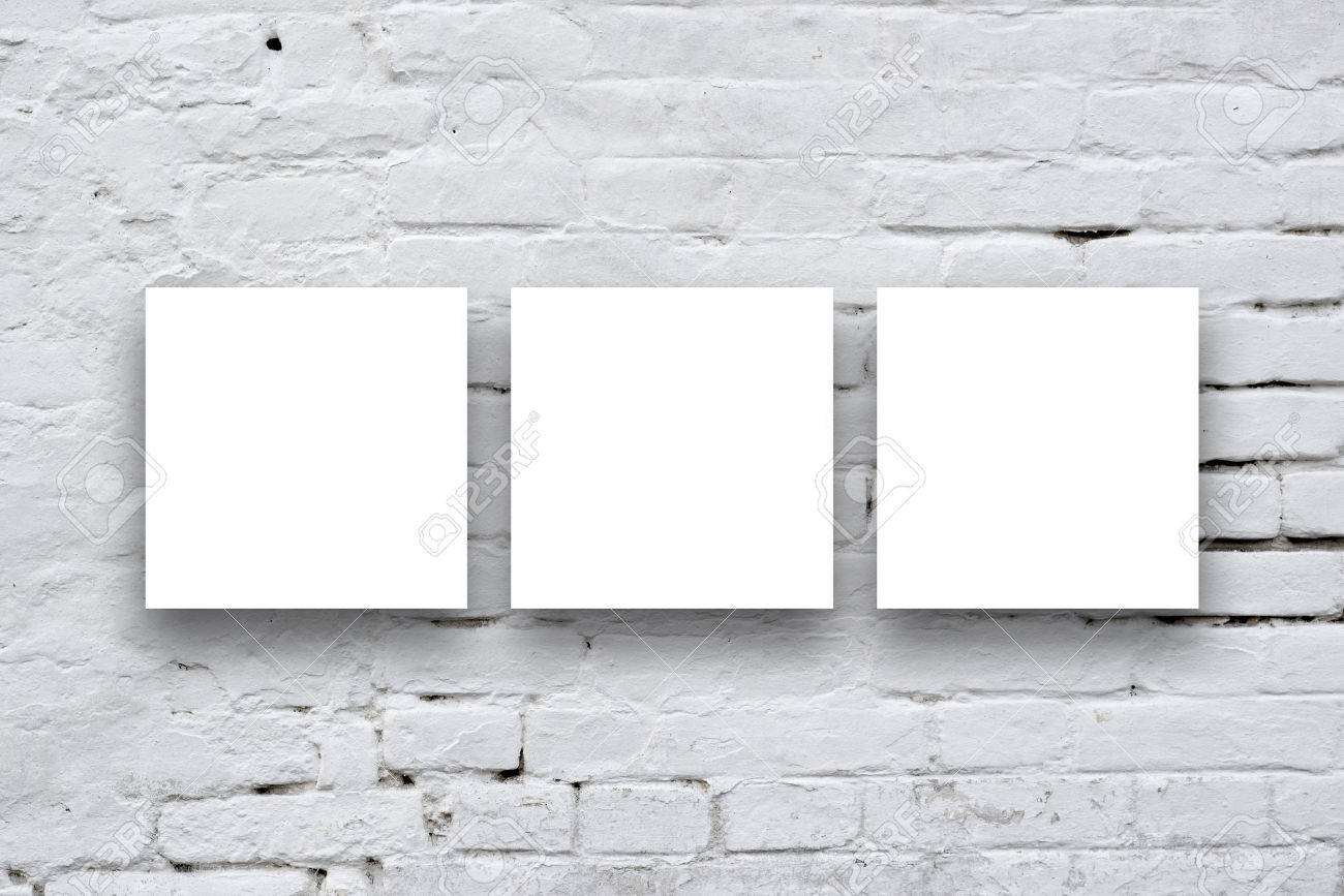Three Square Posters hanging on the art gallery white wall. - 32019522 Three Square Posters hanging on the art gallery white wall. - 32019522