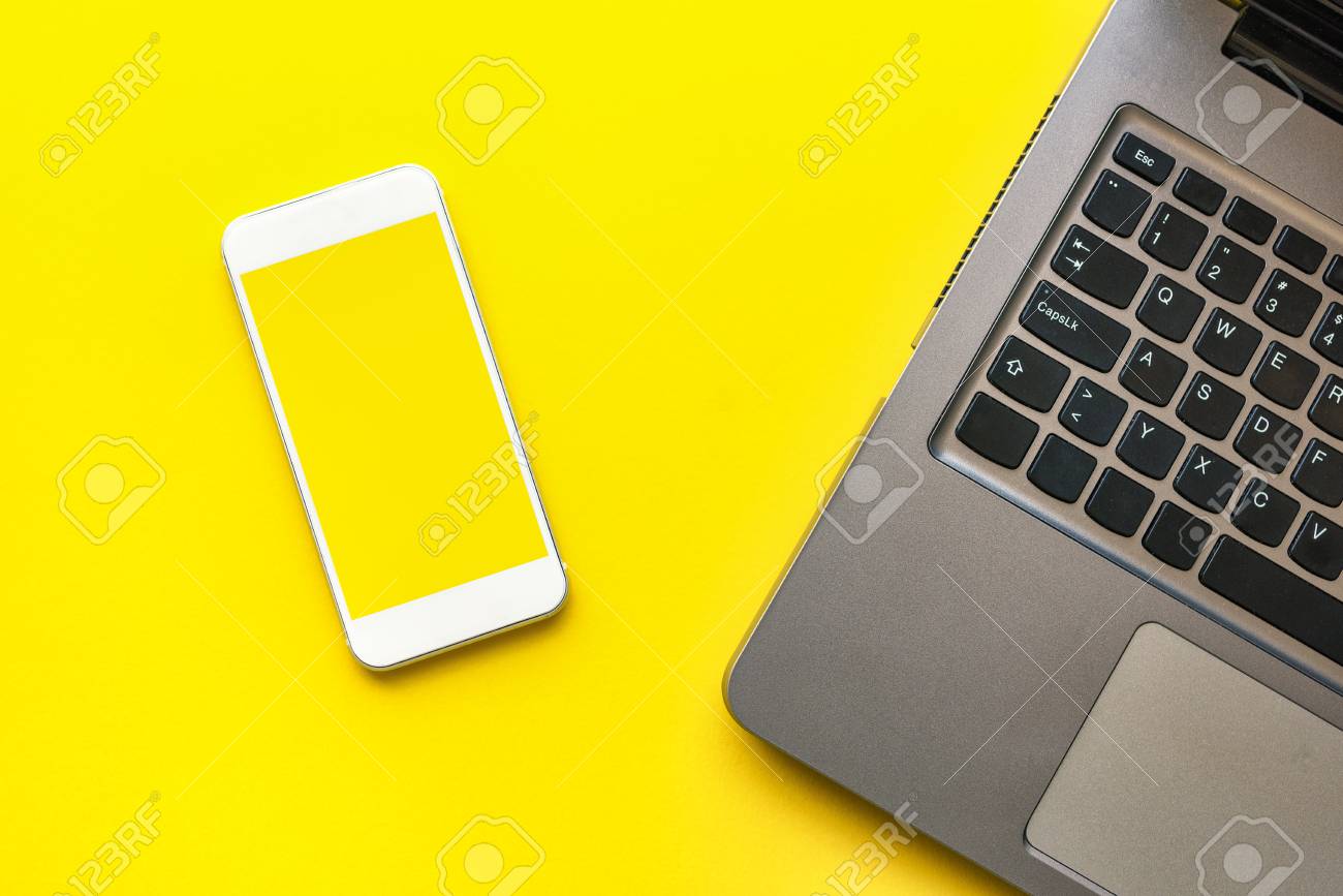 Download Smartphone Mock Up Screen And Laptop Computer On Yellow Background Stock Photo Picture And Royalty Free Image Image 105549639 PSD Mockup Templates