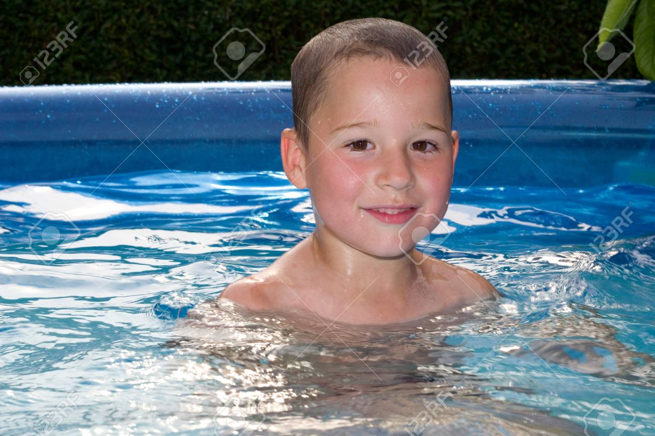 little boy swimming in