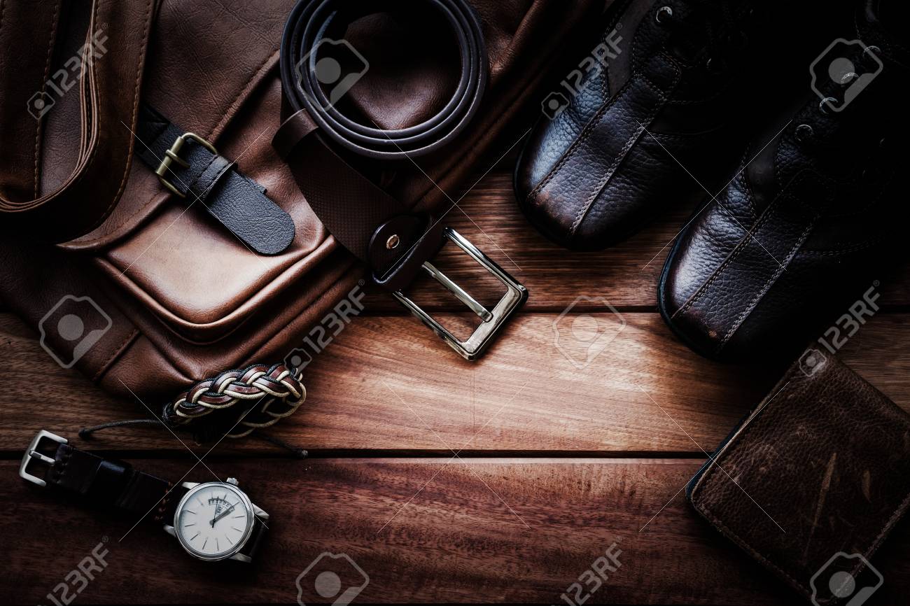Men's leather accessories on rustic wooden background, fashion and beauty, travel concept - 86050259 Men's leather accessories on rustic wooden background, fashion and beauty, travel concept - 86050259