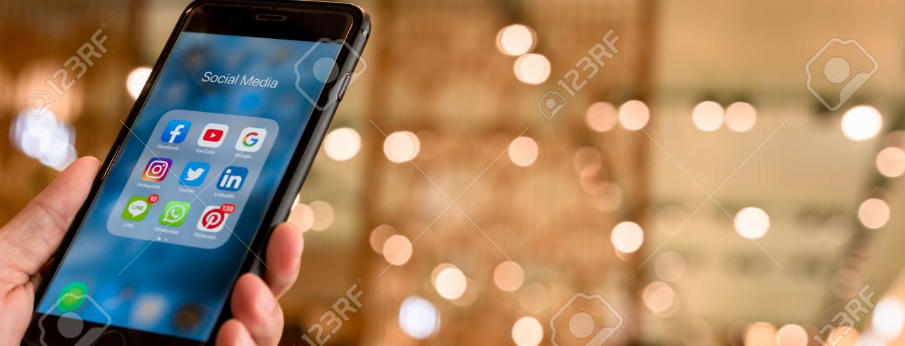 BANGKOK, THAILAND- 26 June 2019 : Hands of man use Iphone 7 plus with social media application of facebook, youtube, google search, instagram, twitter, linked in, line whatsapp, and pinterest - 133917359 BANGKOK, THAILAND- 26 June 2019 : Hands of man use Iphone 7 plus with social media application of facebook, youtube, google search, instagram, twitter, linked in, line whatsapp, and pinterest - 133917359