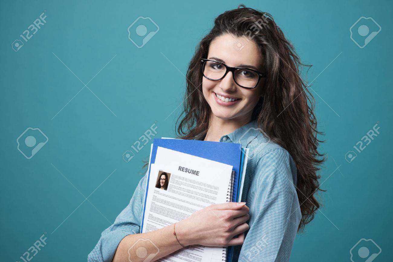 resume Resume Girl young smiling cheerful woman holding her resume stock photo picture resume