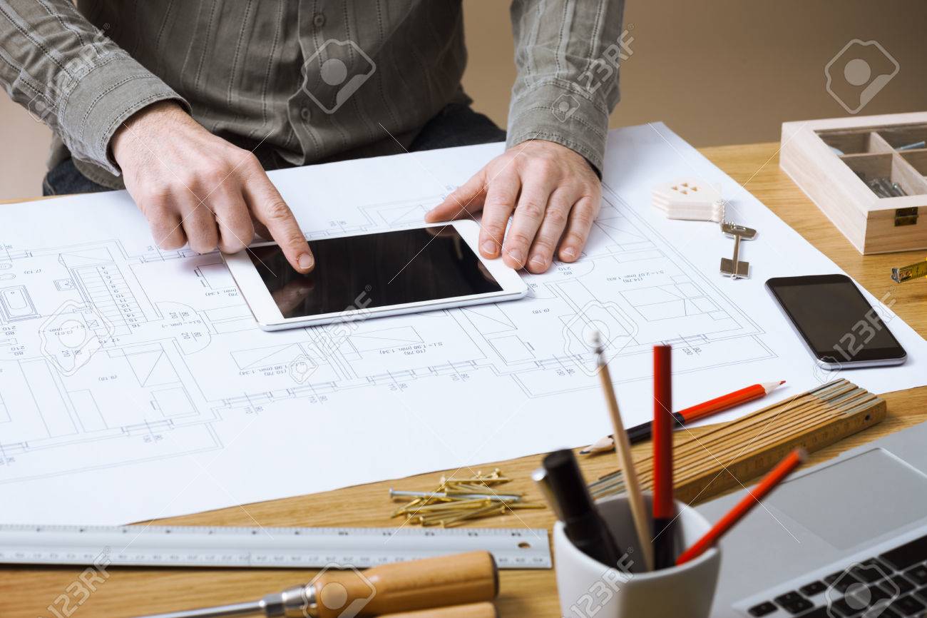 professional architect and construction engineer working at office professional architect and construction engineer working at office