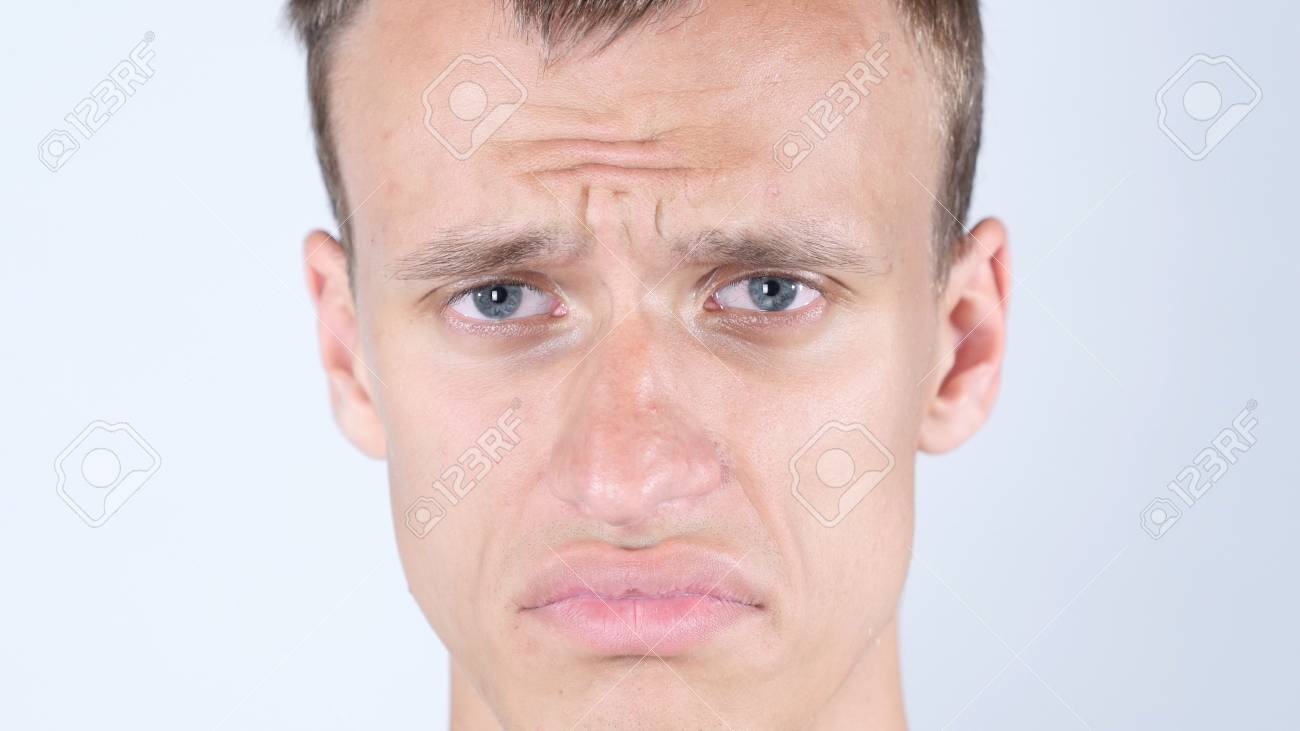 Sad Face Of Young Guy. Close Up Of Man Crying With Tears Stock Photo,  Picture and Royalty Free Image. Image 84502259.