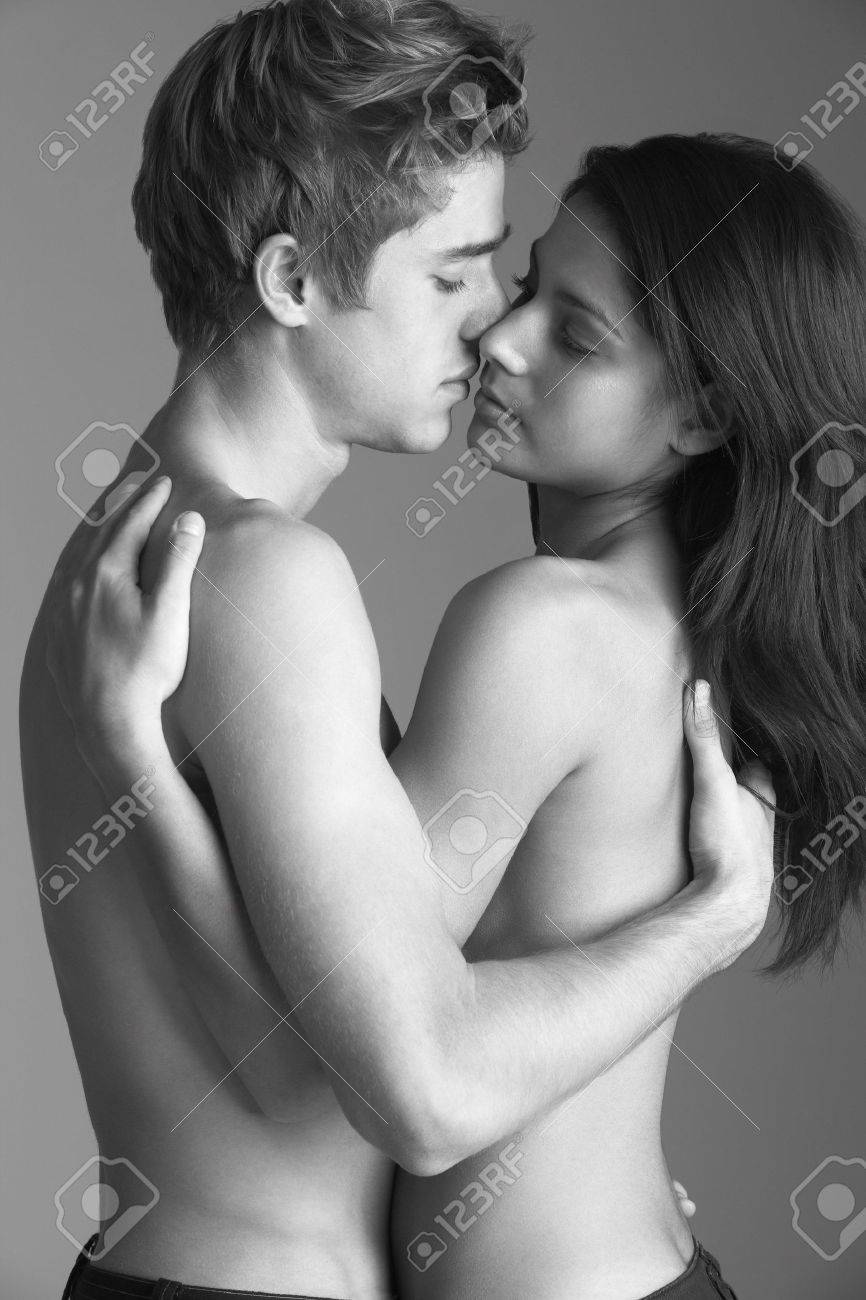 Portrait Of Semi-Naked Couple Kissing Stock Photo, Picture and Royalty Free  Image. Image 6453555.