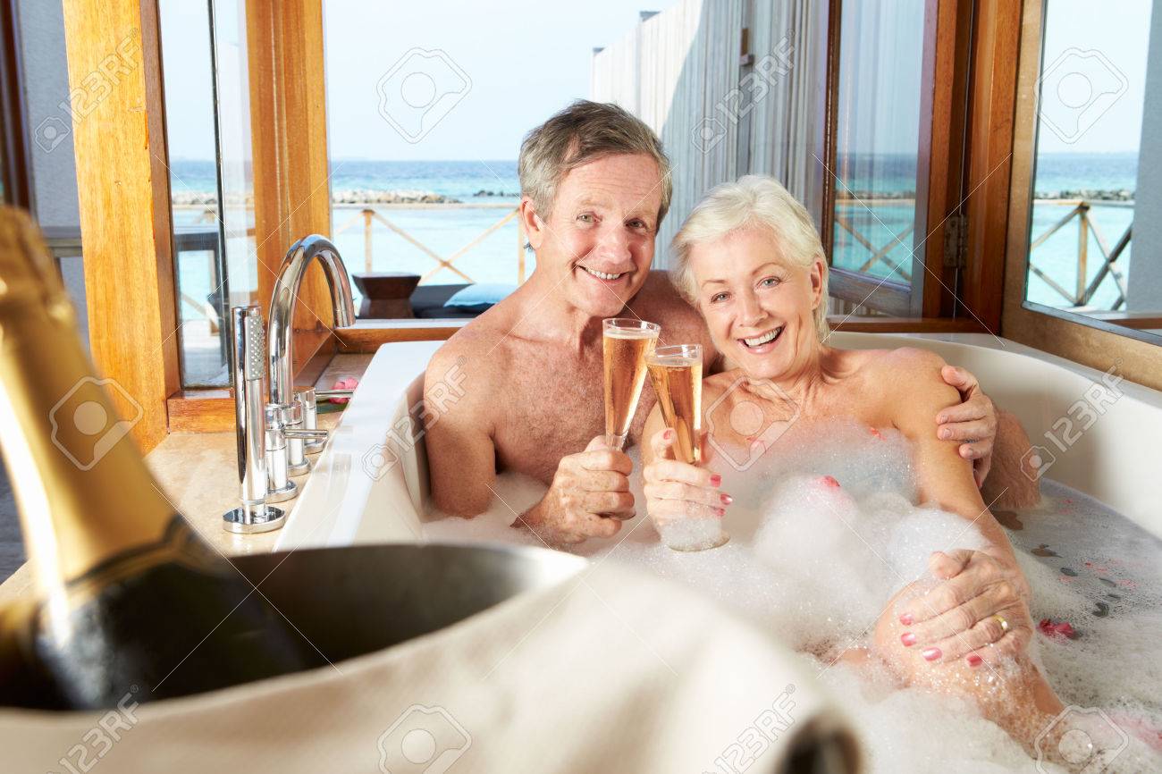 Senior Couple Relaxing In Bath Drinking Champagne Together Stock Photo Picture And Royalty Free Image Image