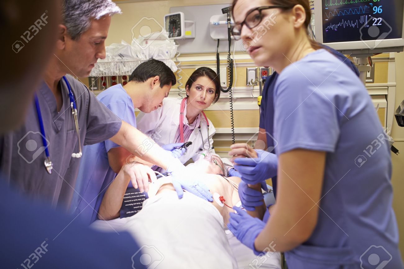 medical team working on patient in emergency room stock photo emergency room medical assistant